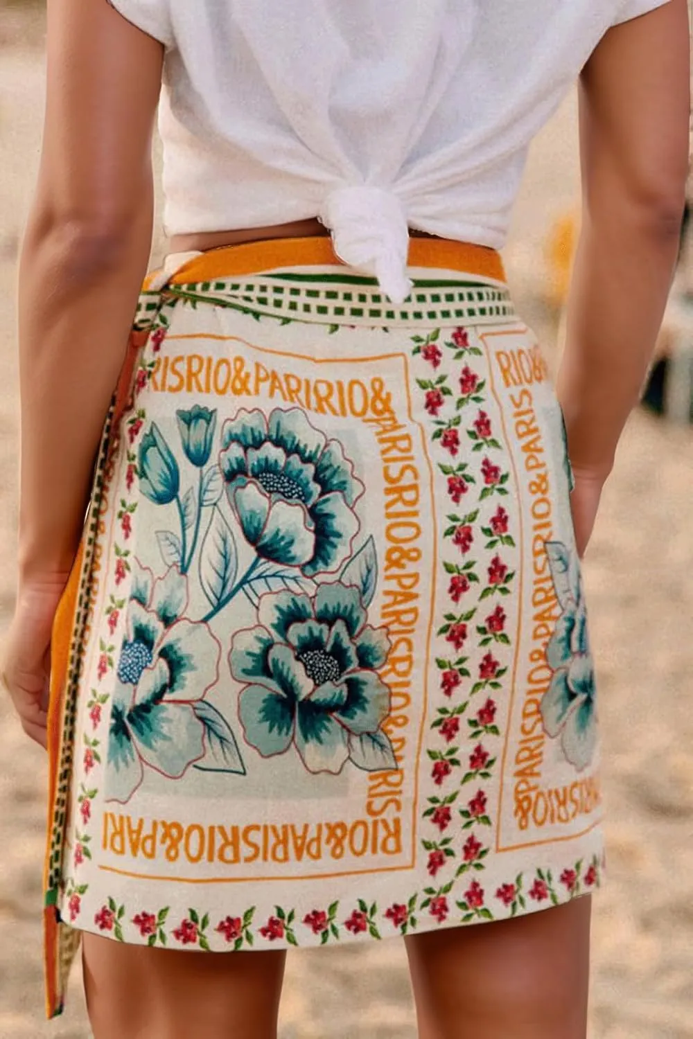 CHARTOU Women's Summer Floral Print Wrap Short Skirt Knot Side High Waist A Line Beach Mini Skirt